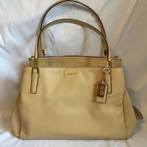 Tan Coach purse